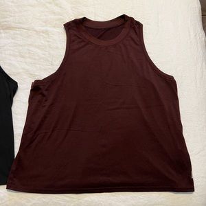 Two  Vuori Energy Tank Tops.